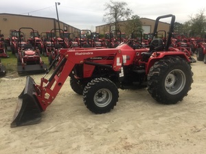 Mahindra® tractor parked outside of a dealership